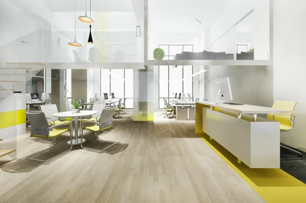 Open plan office with reception desk showing commercial office fit out in Dubai